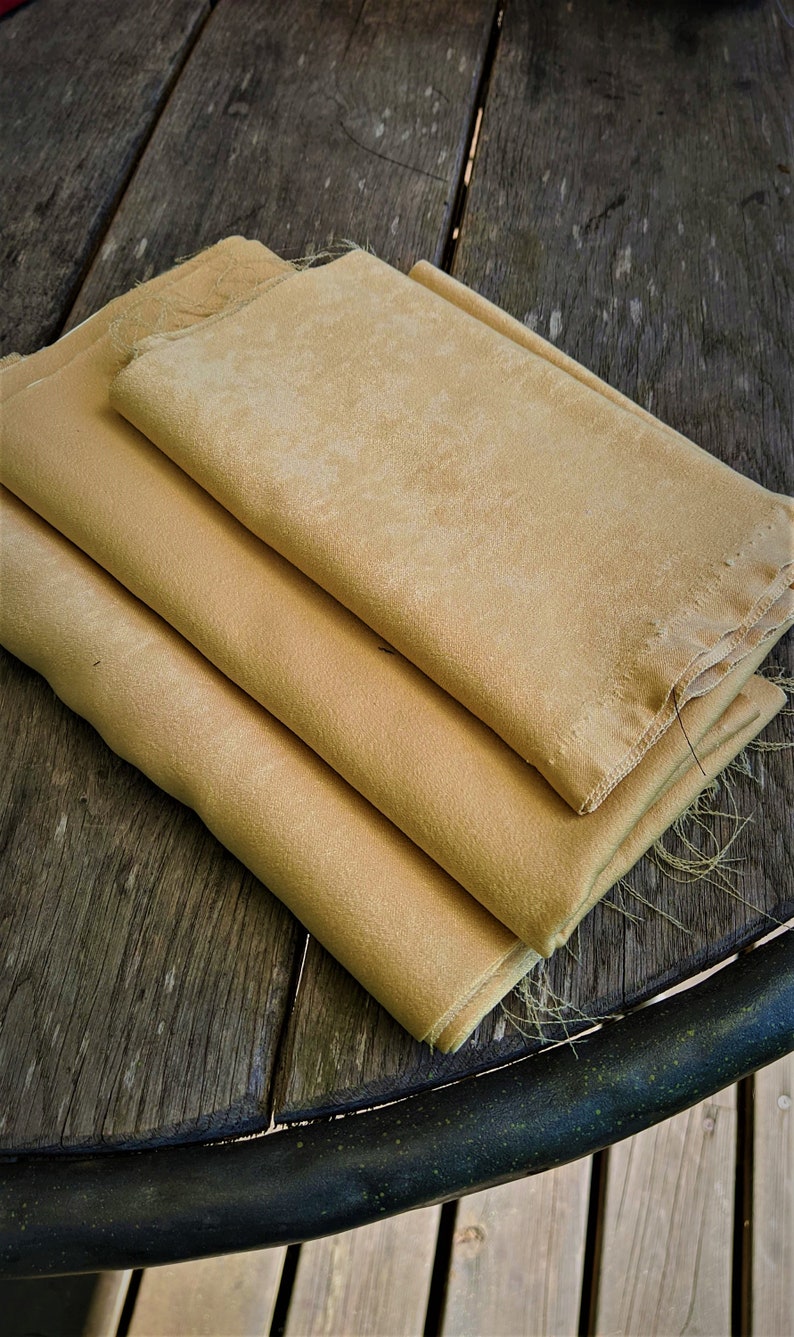 Light yellow fabric cutting curtains waste remains sewing scraps supply handcrafts textile soft