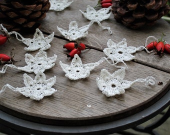 White linen crocheted stars Christmas decor crocheted snowflakes Hanging stars garlands decorations on the botlle white gift packing