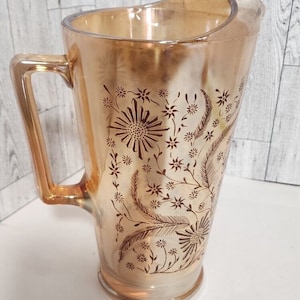 Vintage Jeanette Iridescent Marigold Carnival Glass Pitcher With Floral Pattern