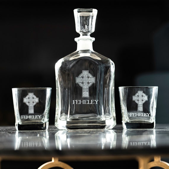 A full engraved Celtic Cross decanter set with matching glasses — personalized heritage barware that feels like a real heirloom, not just a name slapped on a box.
