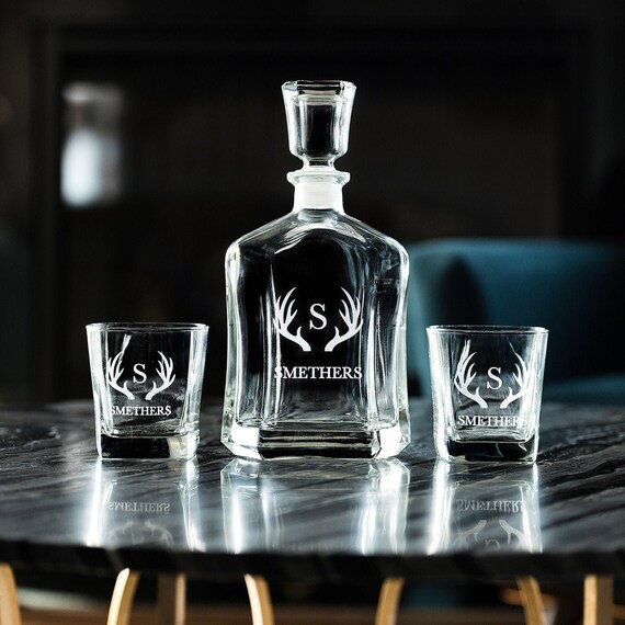 Antler-etched decanter and glasses set — the wildlife motif makes it genuinely distinctive compared to the sea of plain monogram decanters.