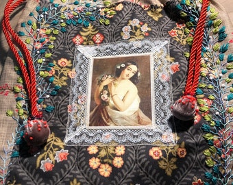 Embroidered pouch woman portrait