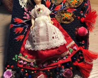 Small folkloric doll embroidered notebook protector