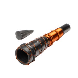 May include: A black metal pipe wrapped in copper wire with a small black metal cone to the side.