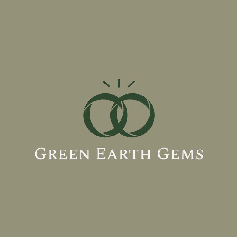 May include: Logo for "Green Earth Gems" on a muted green background. The logo features two interlocking dark green rings with a stylized sunburst above them. The text "GREEN EARTH GEMS" is in white.
