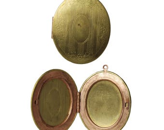 May include: A gold oval locket with a hinged lid. The locket has a floral design and a smooth, polished surface.