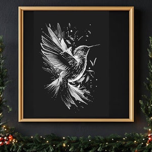 May include: A black fireplace with a lit fire and a Christmas tree decorated with lights and baubles. A white hummingbird illustration hangs above the fireplace. A garland with red berries and lights hangs above the fireplace.