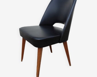 Scandinavian vintage chair with black leatherette compass legs
