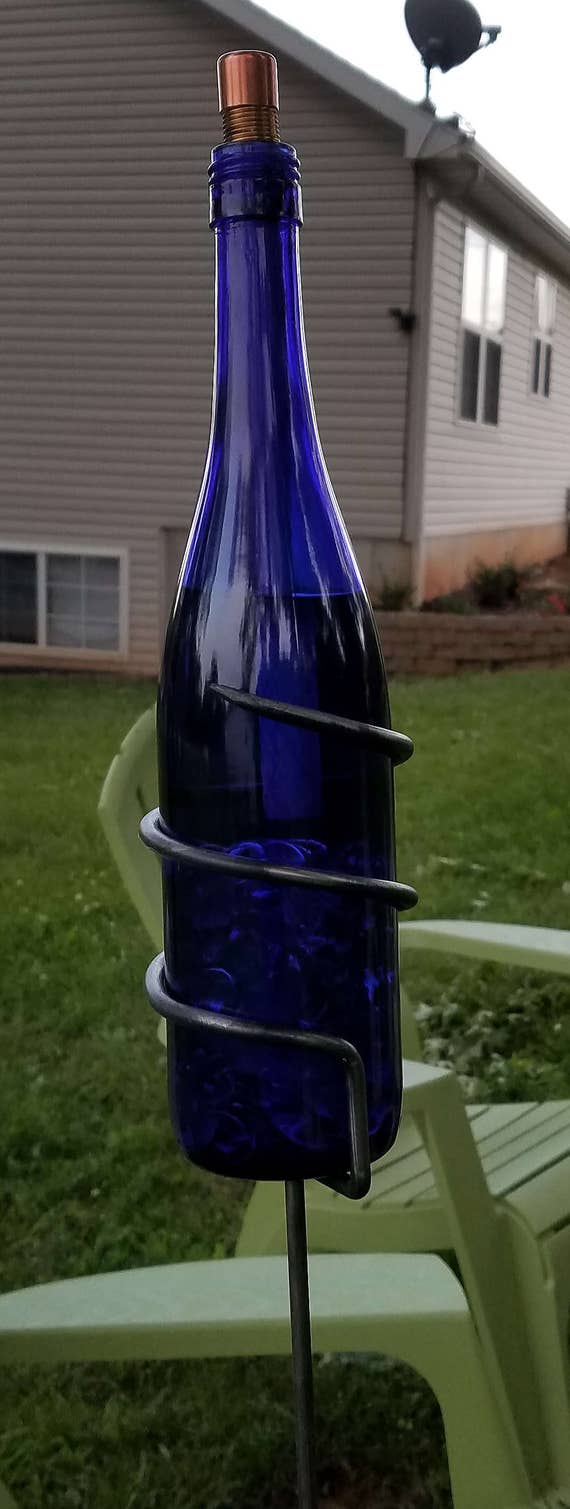 Items similar to Wine Bottle Tiki Torch Holder on Etsy