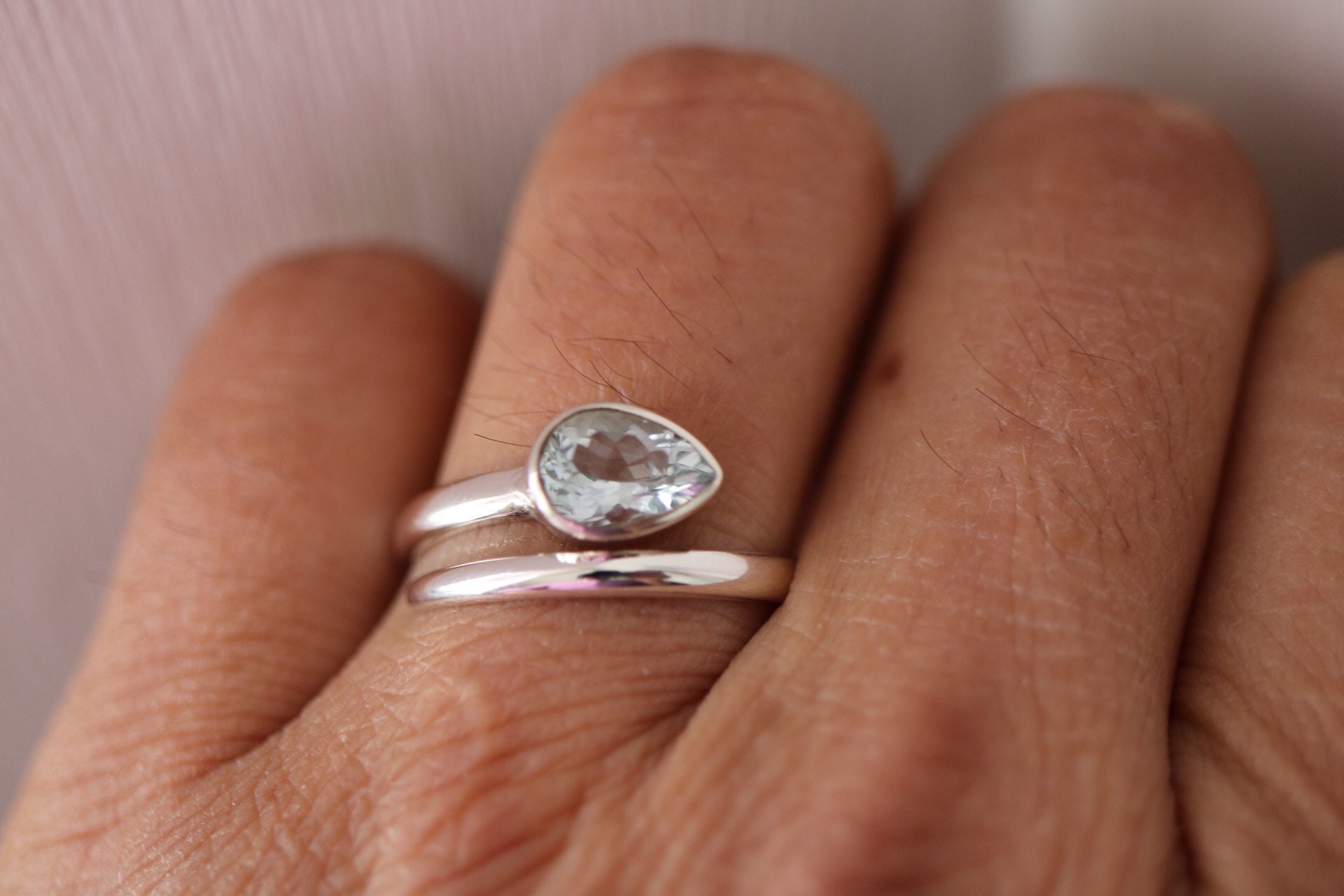 925 sterling silver blue topaz ring with two diamonds