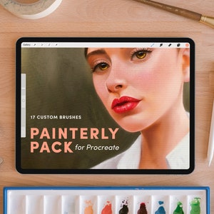 May include: A digital illustration of a woman's face on a tablet screen. The text on the screen reads "17 Custom Brushes Painterly Pack for Procreate".