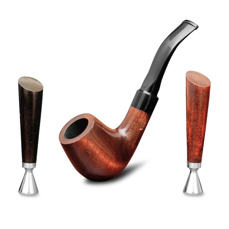 May include: A classic tobacco pipe with a curved stem and a dark brown finish. The pipe is accompanied by two matching tampers, one dark and one light, each with a silver base. The pipe and tampers are set against a white background.