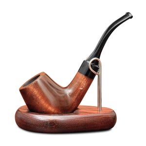 May include: A wooden tobacco pipe with a curved black stem and a dark brown bowl. The pipe rests on a matching wooden stand with a silver metal support. The pipe and stand have a polished finish.