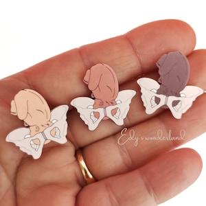 Pin pelvis newborn baby in the womb. Gift for midwife, doula