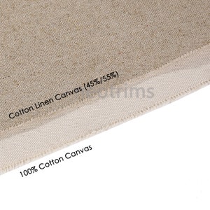 May include: Close-up of two types of canvas fabric. The top fabric is a beige cotton linen blend canvas labeled "Cotton Linen Canvas (45%/55%)". The bottom fabric is a white 100% cotton canvas labeled "100% Cotton Canvas".