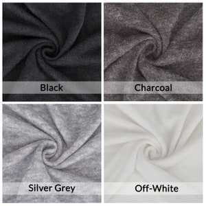 Puede incluir: Cuatro muestras de tela en diferentes colores: negro, carb&oacute;n, gris plateado y blanco roto. La tela es suave y de punto.