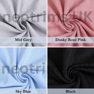 May include: Four fabric swatches in different colors: mid grey, dusky rose pink, sky blue, and black. Each swatch is folded and shows the texture of the fabric.