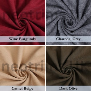 May include: Close-up of four fabric swatches in different colors: wine burgundy, charcoal grey, camel beige, and dark olive. The fabric is a soft, textured knit.