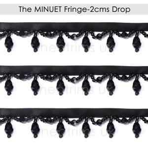 May include: Black beaded fringe trim with a 2 cm drop. The trim is made of small black beads and has a satin backing.