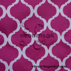 May include: Close-up of a vibrant magenta purple fabric with a white quatrefoil pattern. The fabric has a water-resistant finish, with several water droplets visible on the surface. The text "neotrimsuk" and "Vibrant Magenta Purple" are also visible.