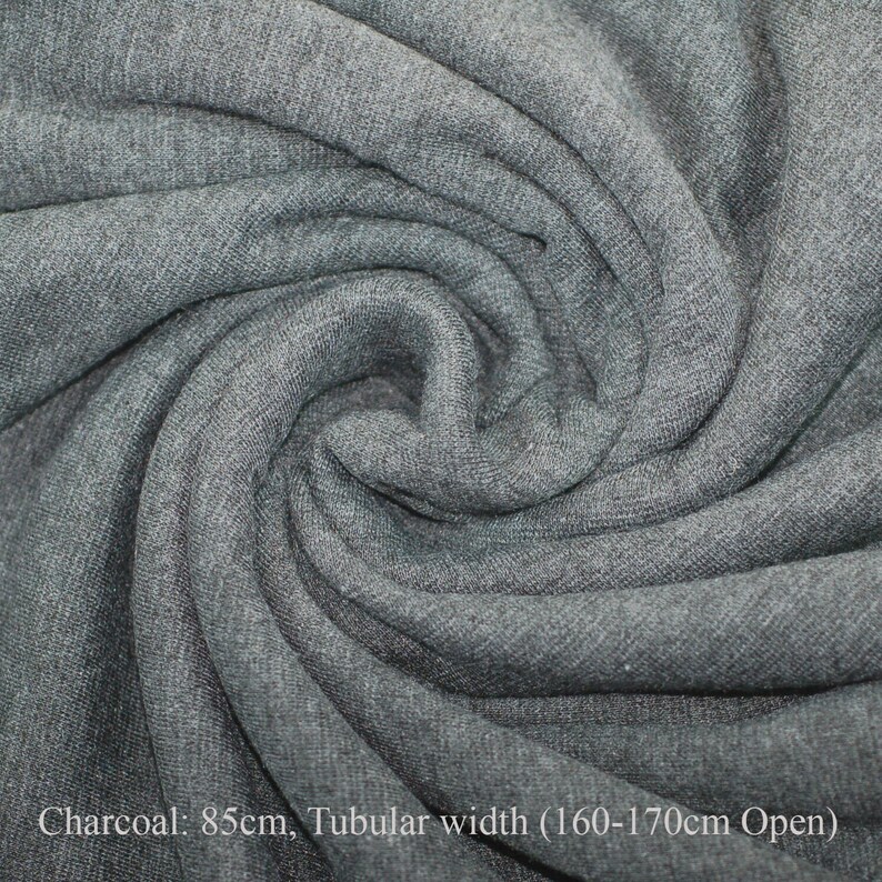 May include: Charcoal gray fabric with a tubular width of 160-170 cm open. The fabric is 85 cm wide.