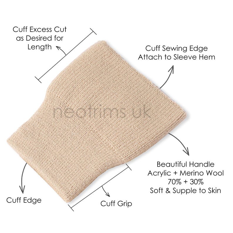 May include: A beige knitted cuff with text indicating it is made of acrylic and merino wool. The cuff has a cuff edge, cuff grip, and a cuff sewing edge. The text also indicates the cuff is soft and supple to the skin.