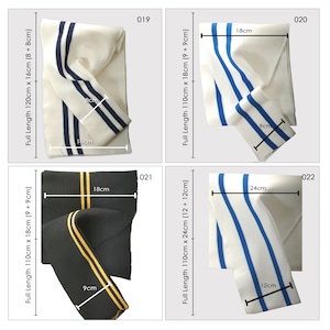 May include: Four different white fabric strips with blue and black stripes. The strips are folded and measured in inches. The strips are labeled with numbers 019, 020, 021, and 022.