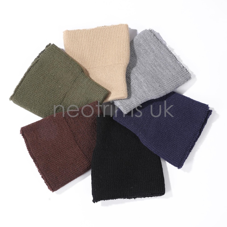 May include: A collection of seven knitted beanies in various colors, including olive green, tan, gray, navy, black, and burgundy. The beanies are arranged in a circular pattern on a white background. The text "neotrims uk" is visible.