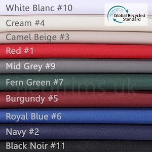 May include: A fabric swatch card with 11 different colors, including white, cream, camel beige, red, mid grey, fern green, burgundy, royal blue, navy, and black. The card also includes the text "Global Recycled Standard".