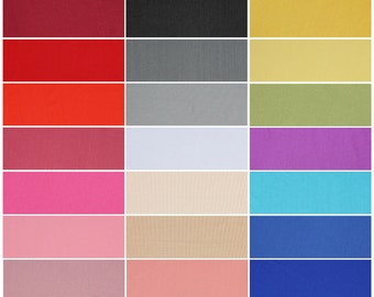 Puede incluir: Una colección de 18 muestras de tela en varios colores, incluyendo rojo, negro, amarillo, verde, morado, azul, rosa y beige. Las muestras están dispuestas en tres filas de seis.