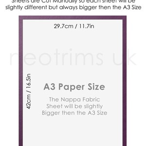 May include: A purple-bordered white sheet with the text "The Nappa Fabric Sheet is slightly bigger then the A3 Paper Size. Sheets are Cut Manually so each sheet will be slightly different but always bigger then the A3 Size" and "A3 Paper Size. The Nappa Fabric Sheet will be slightly Bigger then the A3 Size". The sheet measures 29.7 cm by 42 cm, or 11.7 inches by 16.5 inches.