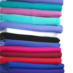 Polyesterjerseystickad ribbstickad stretchväv och matchande ribbstickning, manschetter, midjeband. Klänningsmaterial, kantband för att trimma plagg. Neotrim bild 1