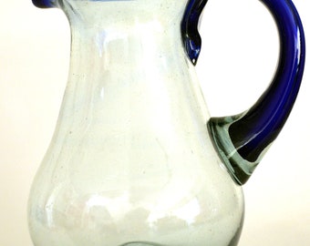 Hand blown glass pitcher with a blue rim pear shape 80 oz