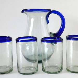 Set of 1 pitcher 80 oz and 4 blue rim handblown water glasses 18 oz.&quot; and the spiraled &quot;Set of 4 handblown rocks glasses 8 oz.&quot; Shipping too