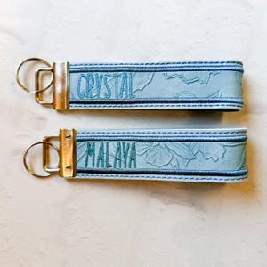 Floral Embossed Vegan Leather Wristlet Keychain - Light Blue Key Fob image 1