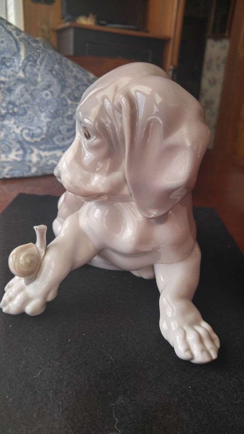 lladro dog and snail