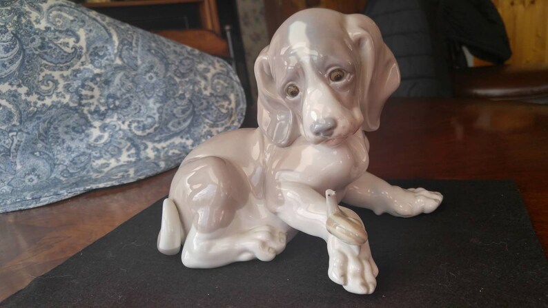 lladro dog and snail
