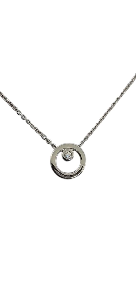 14 Karat White Gold Circle and Diamond Pendant Nec