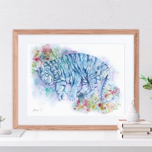 a framed watercolor painting of a tiger, with a wooden frame and a white background.