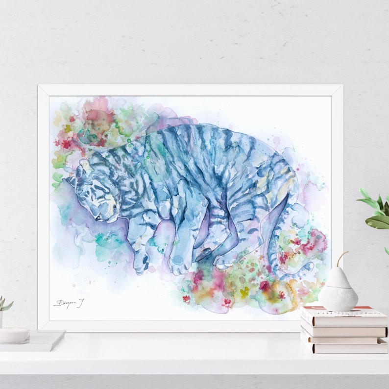 The image is a framed watercolor painting depicting a tiger in a colorful, abstract style.