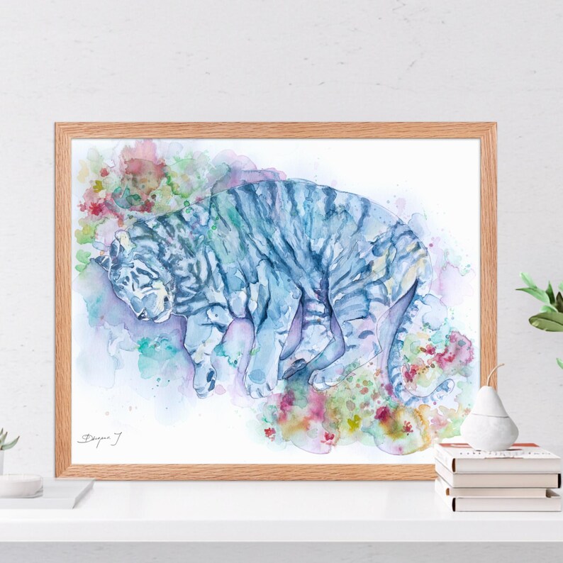 a framed watercolor painting of a tiger, with a wooden frame and a white background.