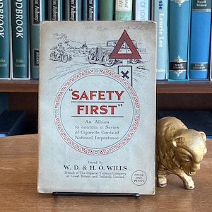 Wills' sigarettenkaarten: 'Safety First', met een album met een reeks sigarettenkaarten van nationaal belang, met 50 kaarten