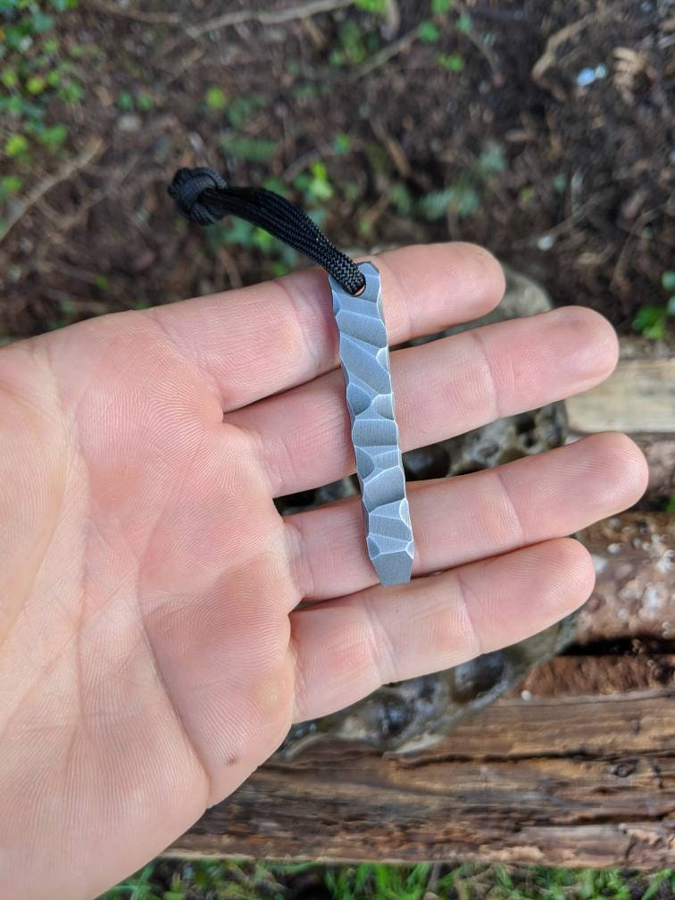 Sculpted mini pry bar in Nitro V stainless steel. EDC Gear