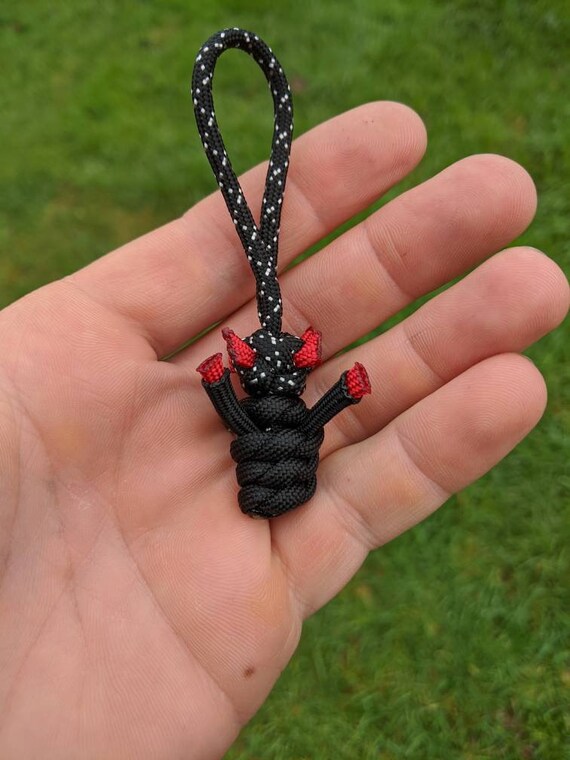Horned Villian paracord bead. keychain Fob zipper pull.