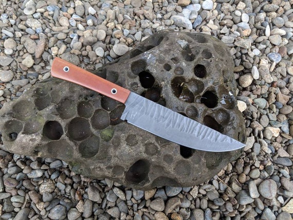Sculpted blade chef knife