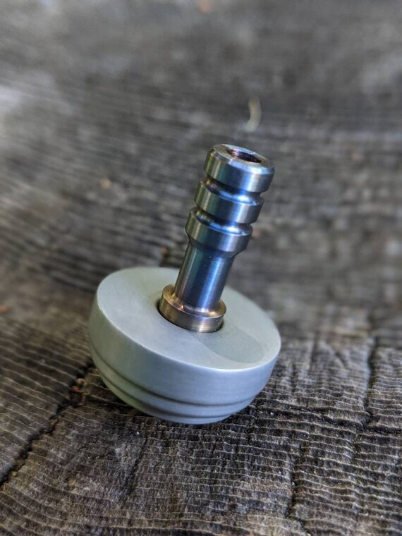 Titanium and O1 steel mini top. / Mini top / spinning top / pocket top / edc top