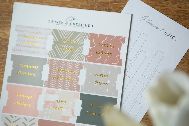 May include: A set of 9 printable divider labels with gold lettering and various patterns. The labels include "Wedding Numbers", "Wedding Readings", "My Sap Joshua", "Baby Judges", "The Ruth", "Guest Book", "Something Blue", "Something Old", and "Something New".