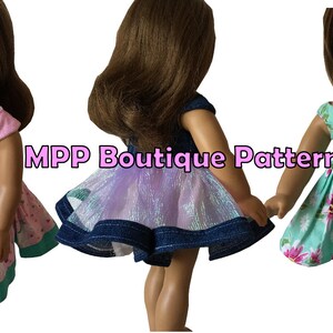 May include: Three doll dresses in different styles and colors. One is pink with a unicorn pattern, another is blue with a shimmering skirt, and the third is mint green with a floral print. The dresses are displayed on dolls.
