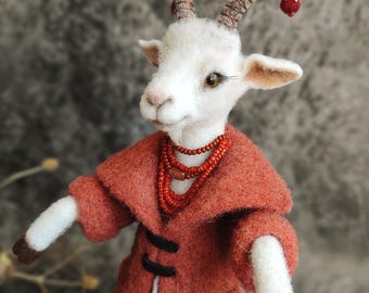 Gevilte geitenpop 2027 jaarsymbool, handgemaakte wollen sculptuur, geluksgeit kerstdecor