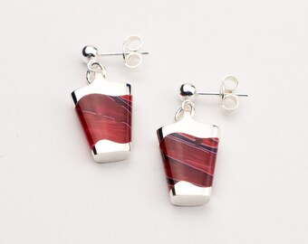 Dangling red silver earrings